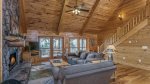 Living Room Features Flat Screen Tv, Gas Fireplace, & Access to Screened Deck